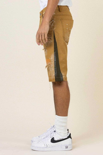 MULTI CAMO PANELED  RELEASED HEM DENIM SHORTS