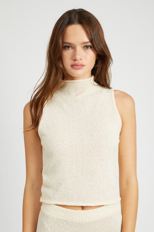 Sleeveless turtle neck knit top