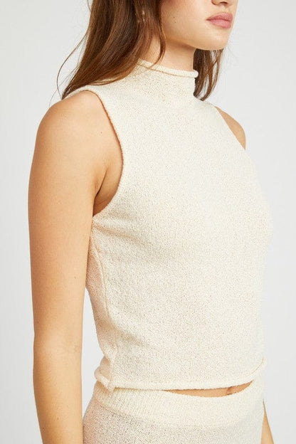 Sleeveless turtle neck knit top