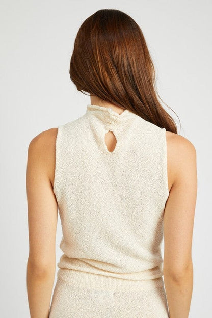 Sleeveless turtle neck knit top